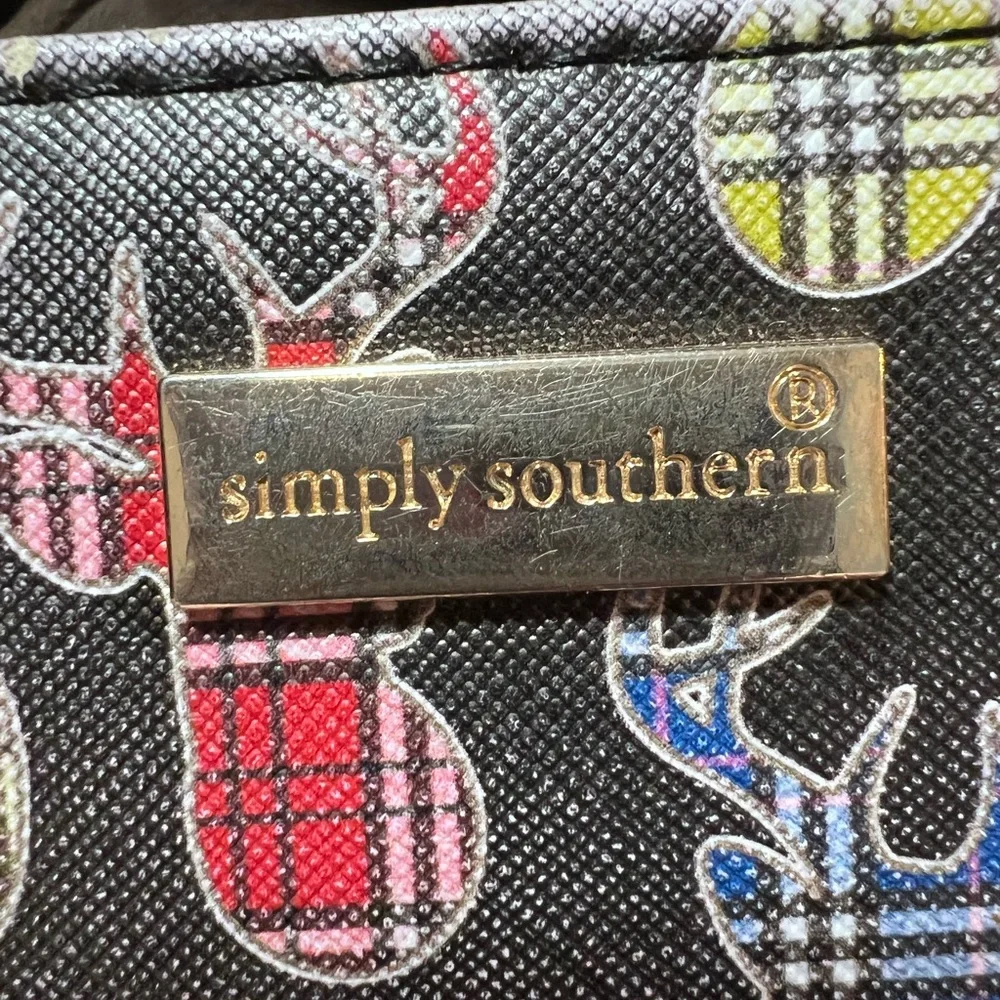 Simply southern wallet. Lots of slots for card and zips shut. Has some wear